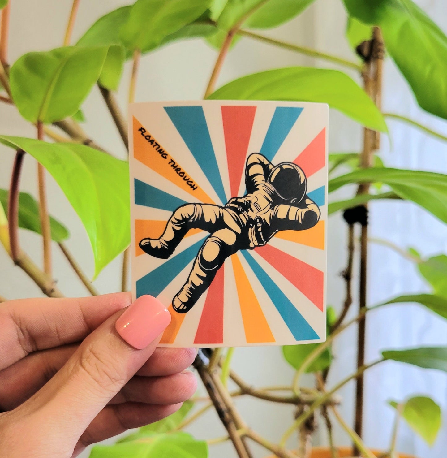 Astronaut Floating Through Sticker